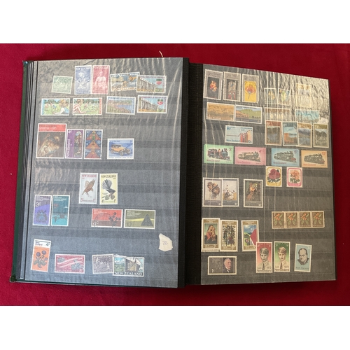 289 - An album housing a large collection of New Zealand stamps