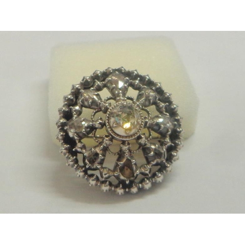 201 - Yellow Metal & Silver Set Circular Brooch set old cut diamond, large central stone with 8 spoked sha... 