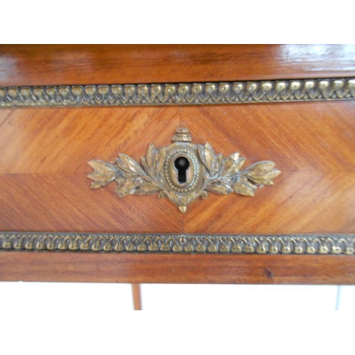 24 - C19th Satinwood Continental Writing Table on square section supports with ormolu mounts, inset hand ... 