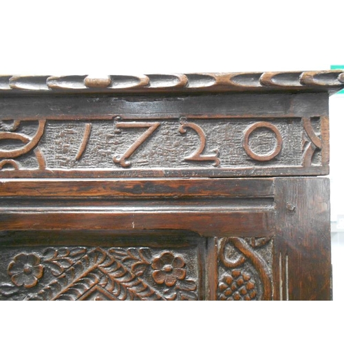 33 - C18th Oak Cabinet with 8 panelled doors to the front & carved 'CDD 1720' above, each side set with n... 