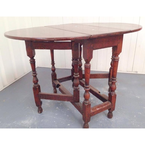 39 - C18th Oak Drop Flap Gate Legged Table on turned supports