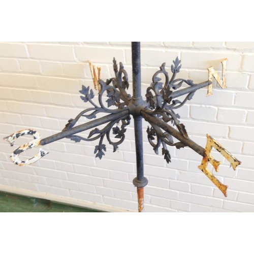 45 - Large Black Painted Weathervane with leaf & scroll decoration, compass points in white with pierced ... 