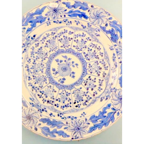 264 - Pair C18th? Chinese Blue & White Chargers, central flower surrounded by 12 segments of flowers & lea... 