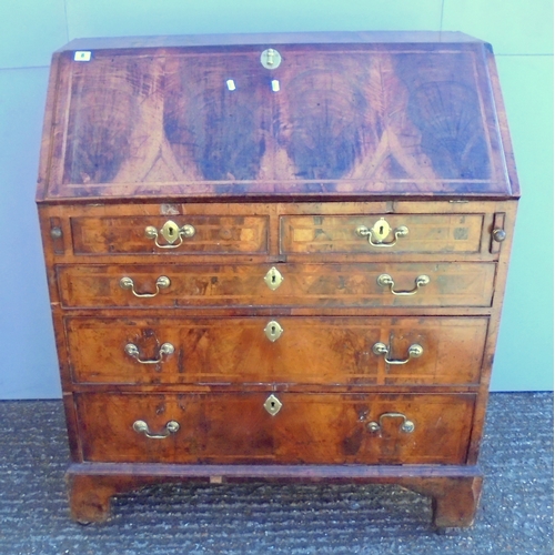 8 - Early C18th George I Walnut Bureau with 3 long graduated cock beaded oak lined drawers & 2 short dra... 