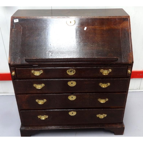 25 - Georgian Oak Bureau with fall enclosing small serpentine fronted draws, central cupboard with pigeon... 