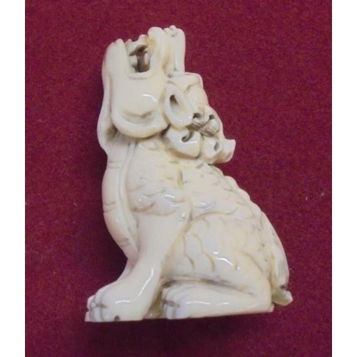 279 - Carved Ivory Netsuke Howling Dog of Fo, signed to foot