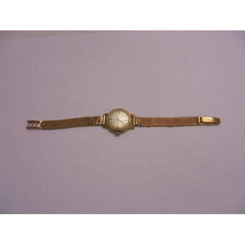 308 - Ladies 18ct Gold Zenith Wristwatch with 18ct gold, silvered dial with baton markers