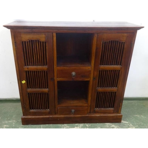 71 - Indonesian Hardwood Side Cabinet on plinth base with small drawer, open shelving with triple panelle... 