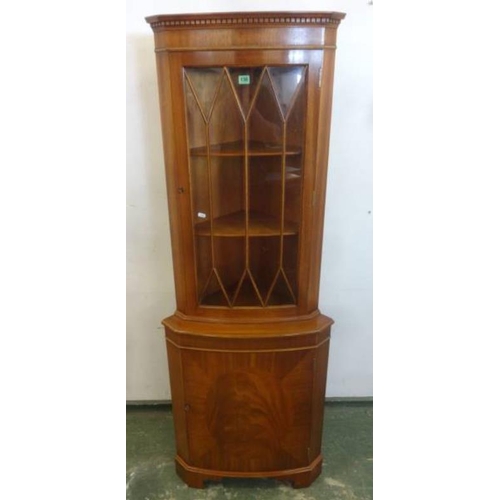 130 - Reproduction Blonde Wood Standing Corner Cabinet on bracket supports, bow fronted flame veneer door,... 