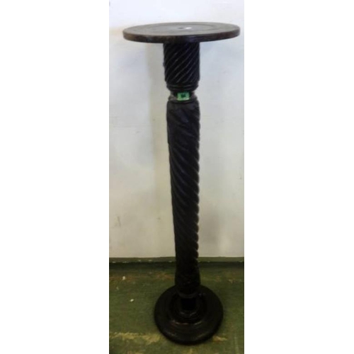 86 - Ebonised Torchere with circular plateau on carved & twisted column, approx. 42