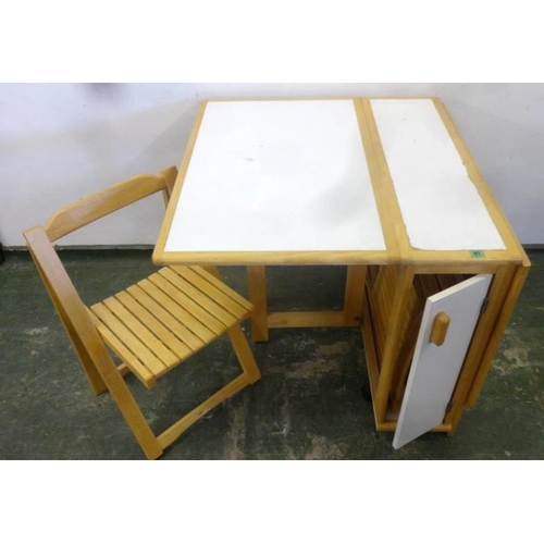 91 - 1960s Drop Flap Table with inset Melamine panel surface, end drawer containing 4 folding chairs (5)