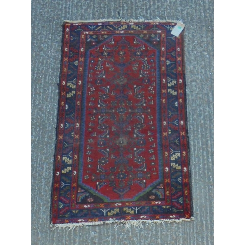 118 - Middle Eastern Style Rug, burgundy ground with blue abstract designs