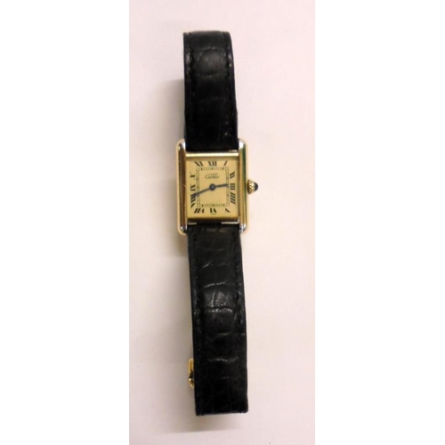 207 - Ladies Silver Gilt Cartier Tank Shaped Quartz Wristwatch, cream dial, Roman numerals, blued hands wi... 