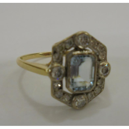 216 - 18ct Yellow Gold Ladies Ring set aquamarine with diamond surround, size R