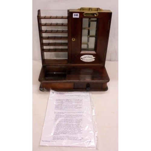 245 - C19th National Cash Register Co. Gold Changer designed by John Cox, 6 shelves with 4 dividers to eac... 