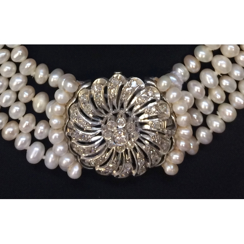 221 - Freshwater 4 Strand Pearl Necklace with brooch clasp set approx. 1.6-1.8 carats diamonds