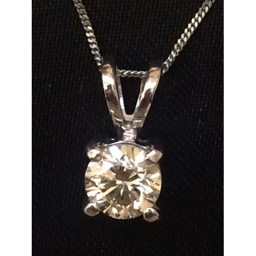 219 - 0.88 carat Diamond Solitaire Pendant set 18ct. White Gold on chain/necklace