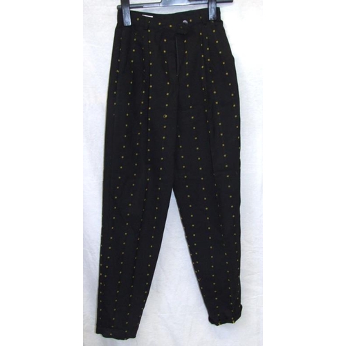 529 - Ladies Clothing: pair black/beige jacquard trousers, Mondi black/yellow trousers, Aquascutum skirt, ... 