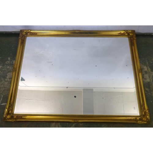 88 - Very Large Rectangular Bevelled Glass Wall Mirror in swept gilt frame