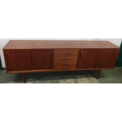 13 - 1960s Long Teak Sideboard with pair sliding doors to each end, nest of 4 drawers to centre with scoo... 