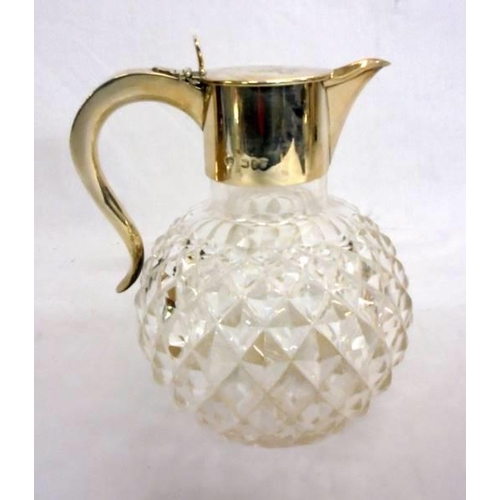 232 - Silver Claret Jug with globe shaped diamond cut body, star cut base, hallmarked London 1890