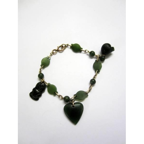 458 - Yellow Metal Tikki Jade Bracelet set heart & figures