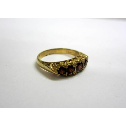 490 - 9ct. Gold 5 Stone Garnet Ring, size N