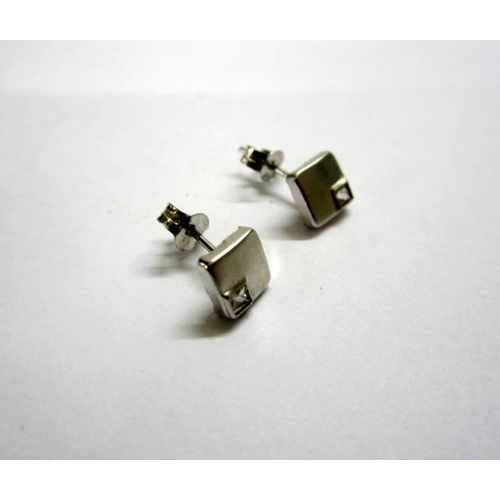 491 - Pair 9ct. White Gold Square Stud Earrings set white stone