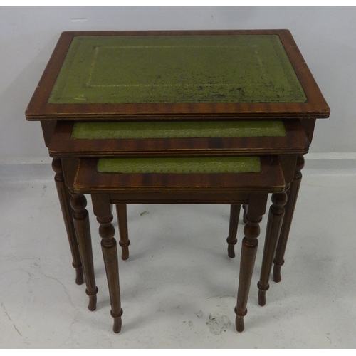 31 - Nest of 3 Rectangular Occasional Tables inset green tooled leather, on turned supports