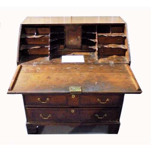 23 - Early C18th Georgian Welsh Oak Bureau, fall enclosing well fitted interior with staged drawers, lowe... 