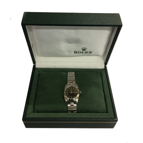 218 - Ladies Rolex Oyster Perpetual Stainless Steel Wristwatch with black dial, bar & Arabic numerals, swe... 