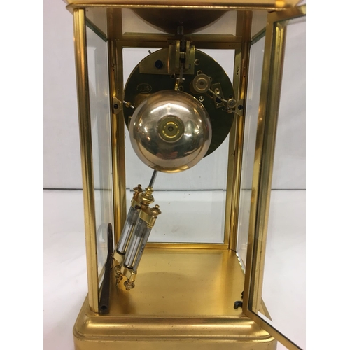 152 - Late Victorian Gilded Brass 4 Glass Mantel Clock with 2 train movement, enamelled dial, gong movemen... 