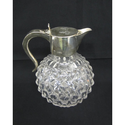 232 - Silver Claret Jug with globe shaped diamond cut body, star cut base, hallmarked London 1890