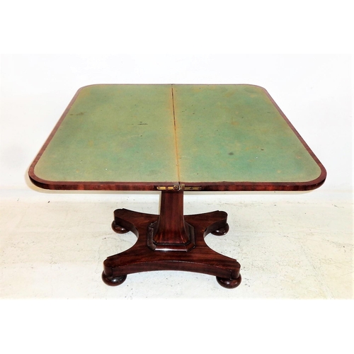 38 - Early C19th Flame Mahogany Games Table with swivel top on shaped faceted centre column, platform bas... 