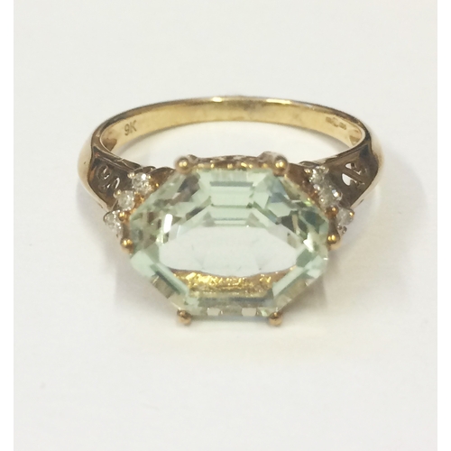 240 - Aquamarine & Diamond Ring set 9ct. Gold, size P 1/2, large octagonal Aquamarine with diamond shoulde... 