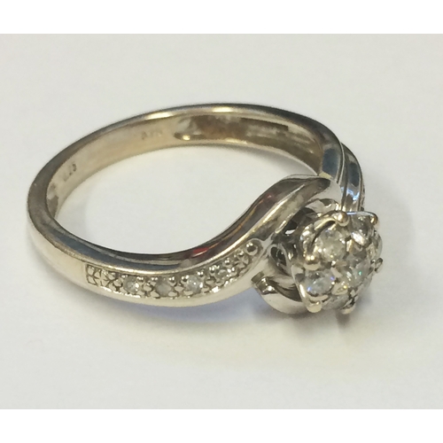 249 - White Gold Diamond Twist Ring, split shank inset diamonds with central cluster, size L, set 9ct. whi... 