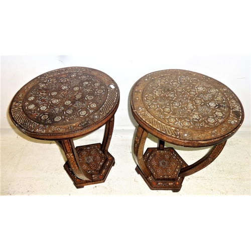 51 - Pair Early C20th North African Occasional Tables with circular tops extensively inlaid with mother o... 