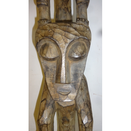 49 - Papua New Guinea Tribal Totem Pole carved with primitive figures representing family generations, ap... 