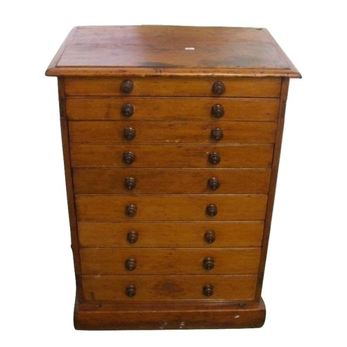 18 - Varnished Pine Collectors Cabinet of 9 graduated drawers with turned wooden handles, on plinth base,... 