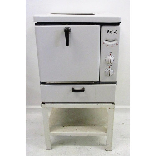 16 - 1940s White Enamelled Belling Cooker with single plate top, pull-down drawer with drawer under, on e... 