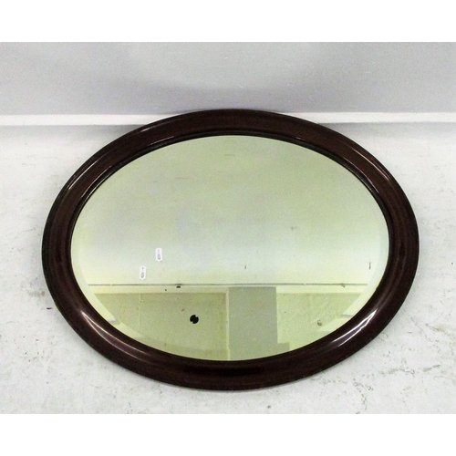 22A - Oval Bevelled Glass Wall Mirror in faux mahogany frame