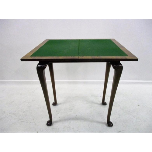 9 - Walnut Rectangular Games Table with mirrored veneers, swivel top with storage under, on tall cabriol... 