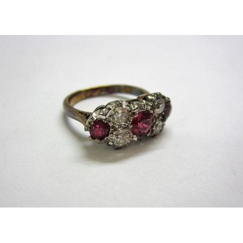 204 - Ladies 18ct Gold 4 Diamond & 3 Ruby Dress Ring size S