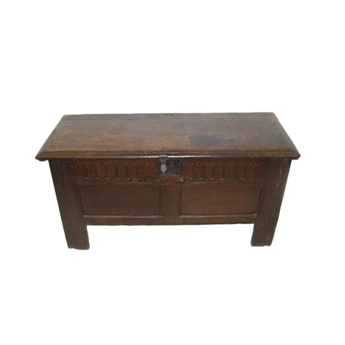 23 - C18th Oak Coffer with hinged cover, interior with candle box, scoop carved frieze, double panelled t... 