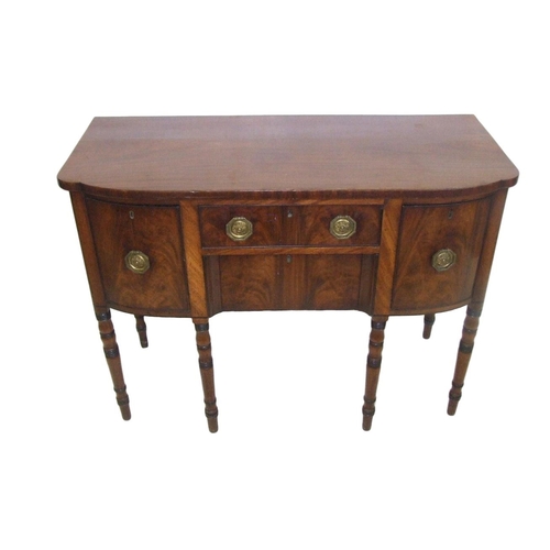 12 - Georgian Mahogany Bow Fronted Sideboard on 4 ring turned supports, left & right hand cupboards with ... 