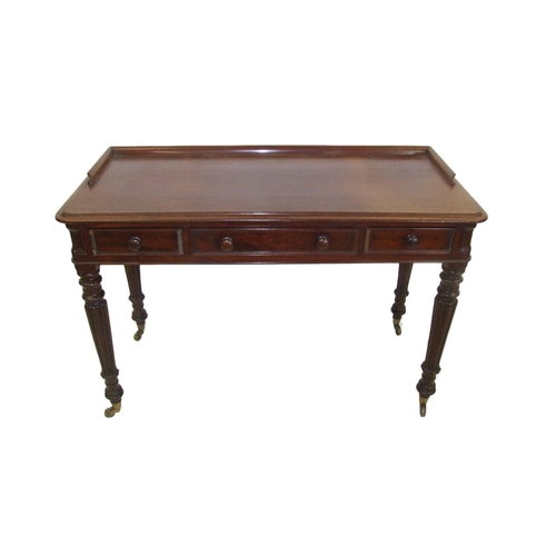 13 - William IV Mahogany Side Table on turned & carved supports with brass cup castors, mahogany lined fr... 