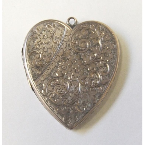 239 - Yellow Metal Victorian Heart Locket Pendant engraved with C-scrolls & flower heads, approx. 4 cm