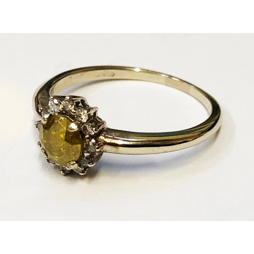 215 - 18ct. White Gold Floral Cluster Ring set central Yellow Diamond with White Diamond Surround, size M