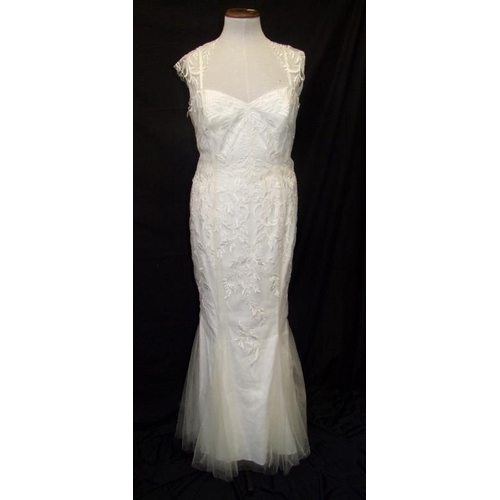 769 - Pearce Fionda Ivory Wedding Dress, embroidered net over satin with fish tail hem with tag showing or... 