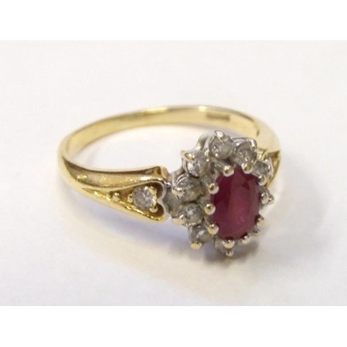 200 - 18ct. Gold Ruby & Diamond Cluster Ring set central ruby with diamond surround & diamond inset should... 